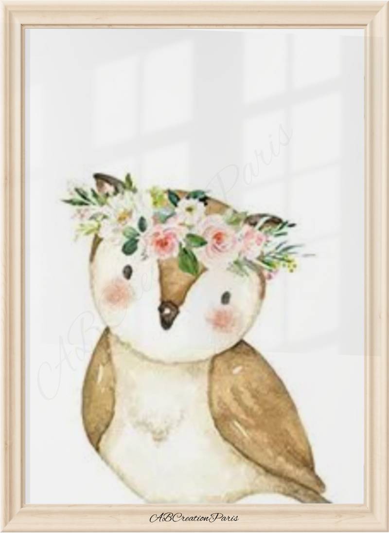 affiche hiboux poser sur une étagère dans la chambre d'un bébé