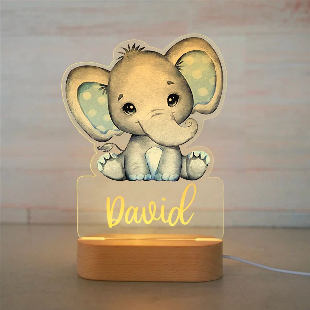 Veilleuse personnalisée éléphant avec nuances bleues, prénom David, parfaite pour une chambre de bébé garçon.