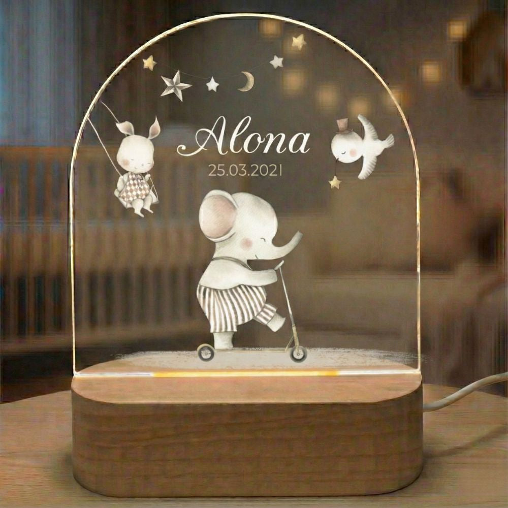 Cadeau de bapteme fille ou garcon. veilleuse personnalisée avec éléphant sur une trotinette